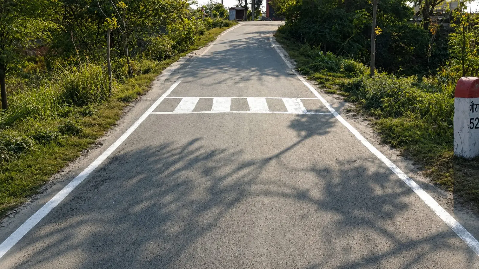 Construction of 2 km bitumen Road connecting Taraiya to Isuapur